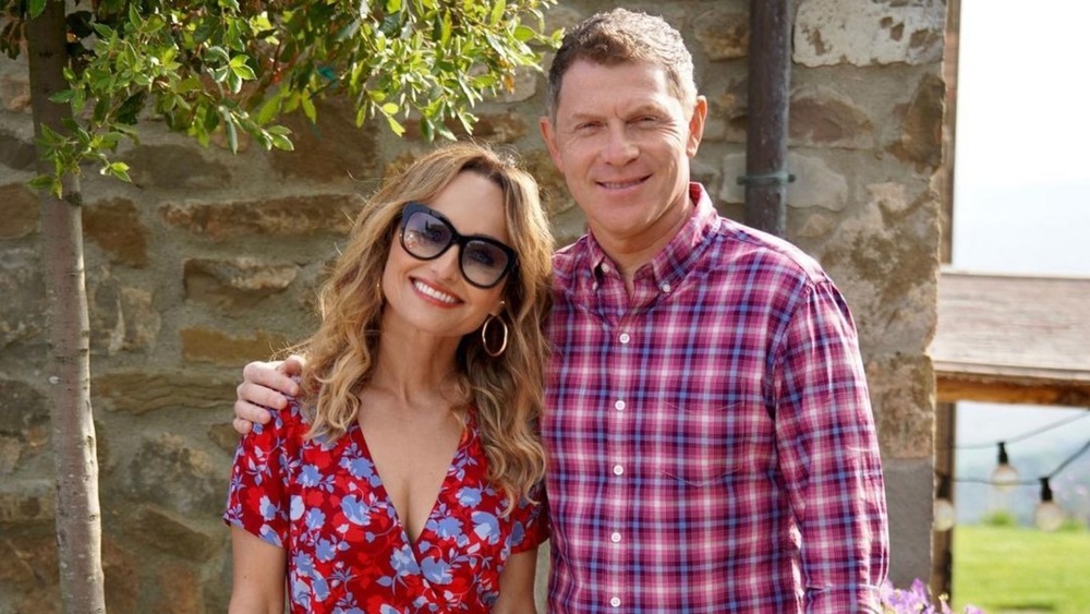 Bobby Flay and Giada De Laurentiis smiling