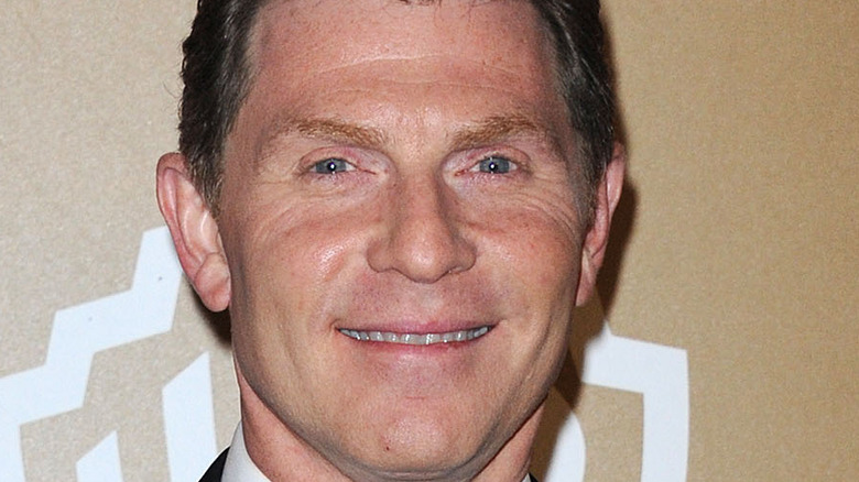 Bobby Flay smiles in headshot