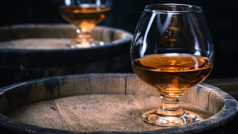 Cognac brandy on a wooden cask 
