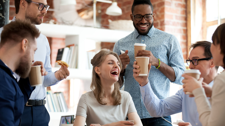 Coworkers enjoying a coffee break together