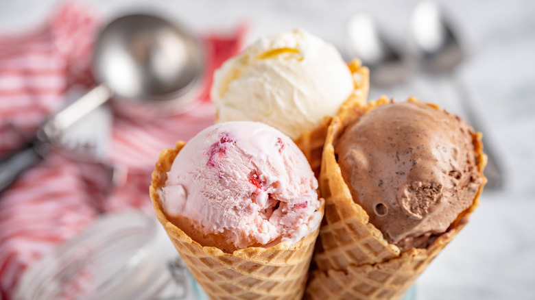 Chocolate, vanilla, and strawberry ice cream cones