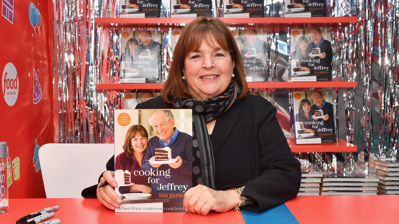 Ina Garten with her cookbook