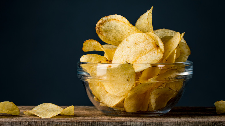 Potato chips in glass bowl