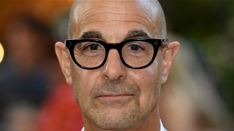 Stanley Tucci wearing glasses