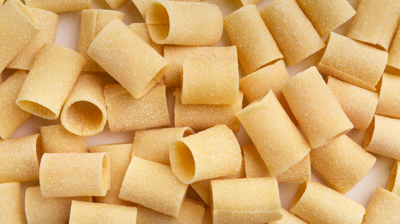 Paccheri pasta on a white surface 