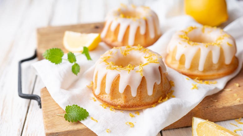 Mini lemon bundt cakes on white cloth