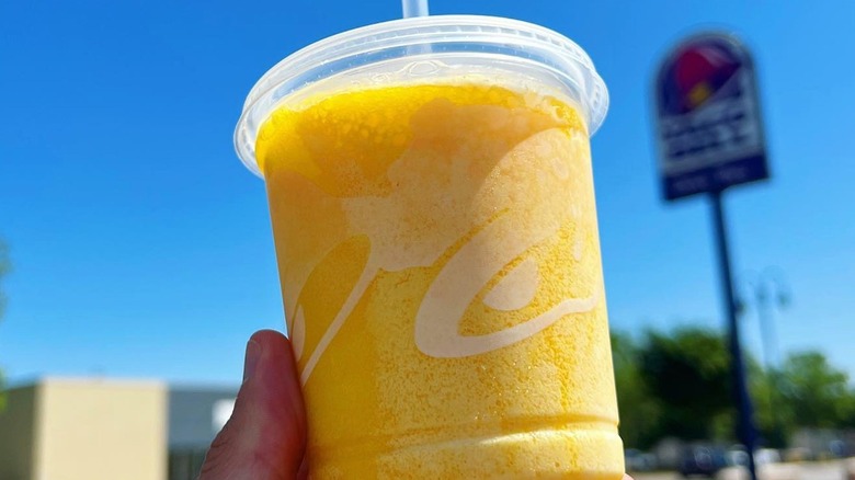 Mango Whip Freeze in front of Taco Bell