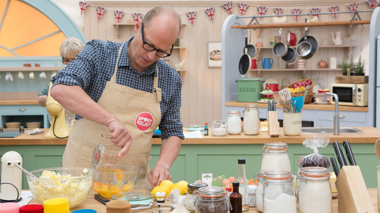 Contestant baking on Bake Off