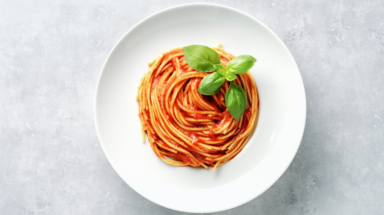 pasta with red sauce and basil