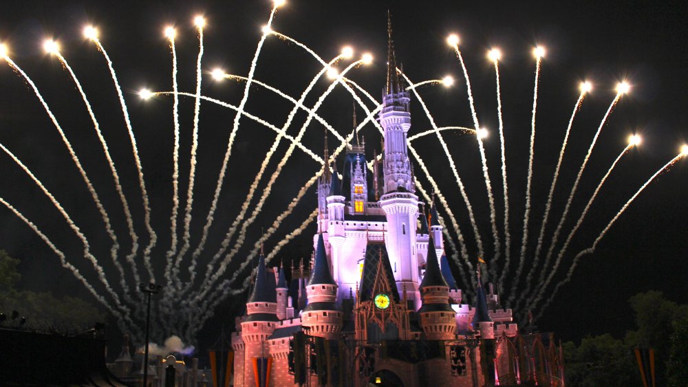 Disney castle with fireworks