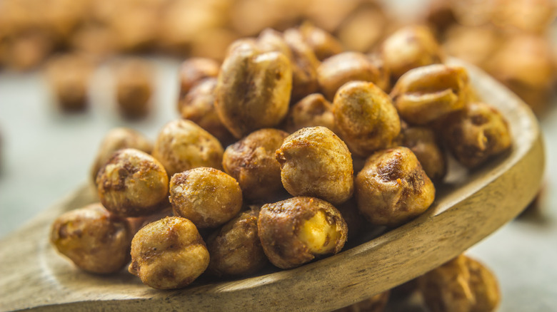 roasted chickpeas on wooden spoon 