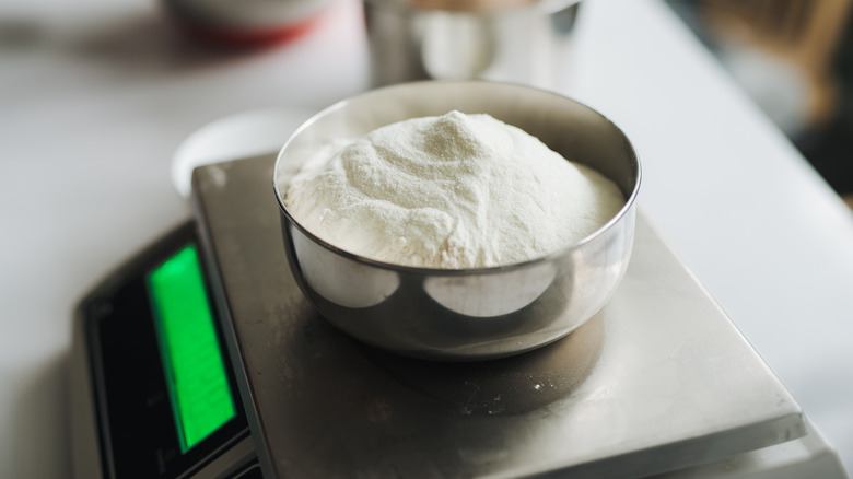 Bowl of white flour on a digital scale
