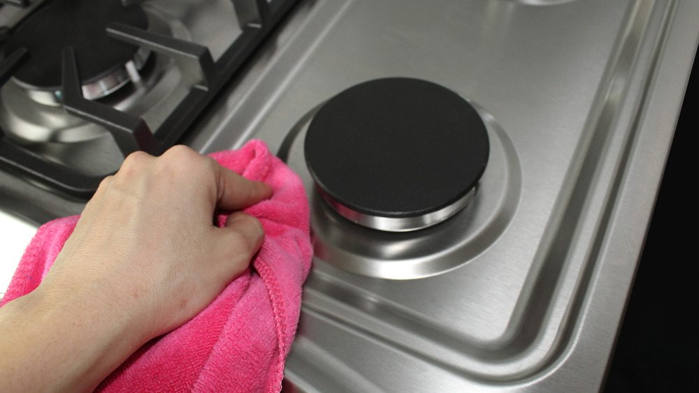 Cleaning a stove burner