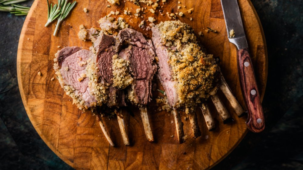 cooked lamb ribs on cutting board