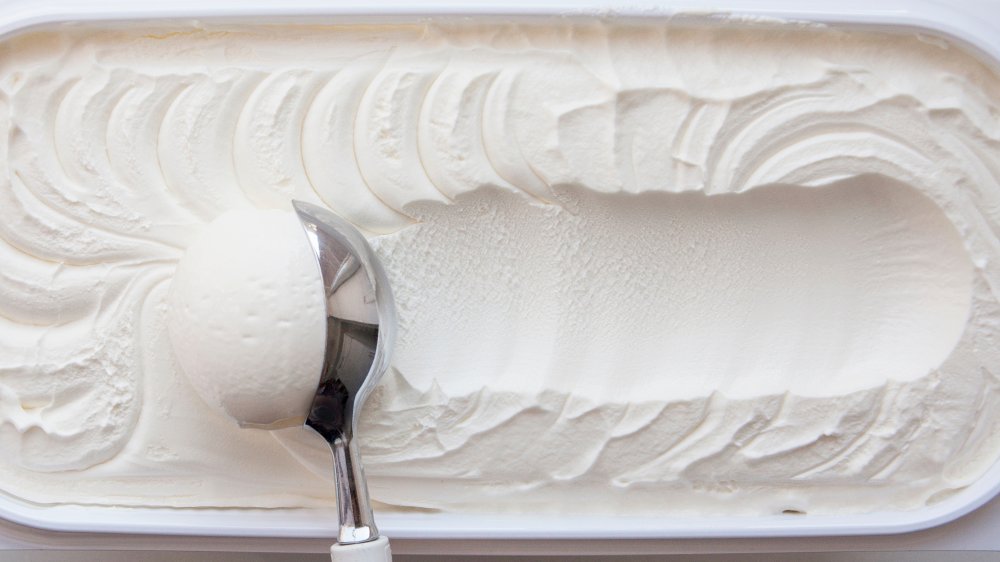 Vanilla ice cream being scooped