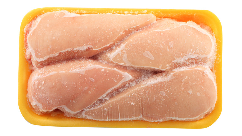 Four frozen skinless chicken breasts