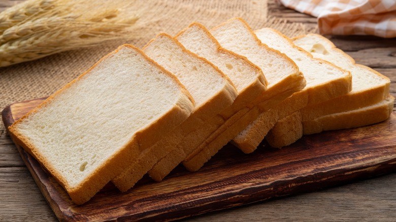 sandwich bread on wooden board