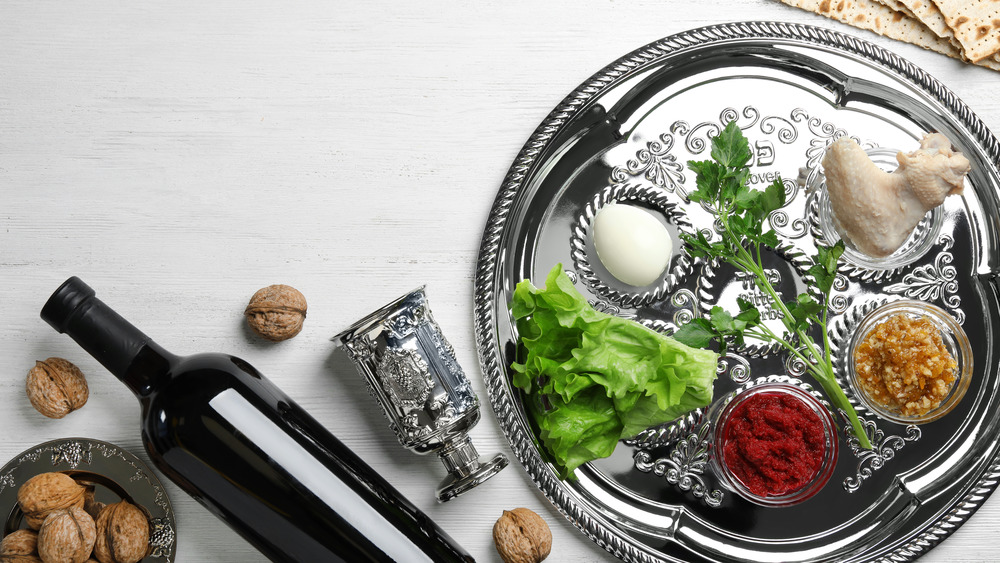 Silver Seder plate with decorative scrollwork