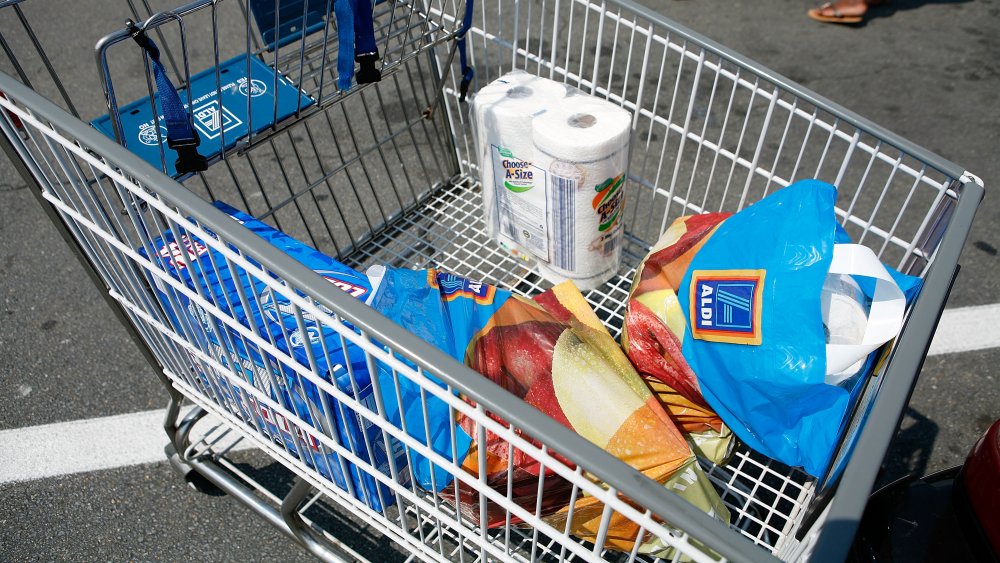 Shopping cart at Aldi with plastic bags