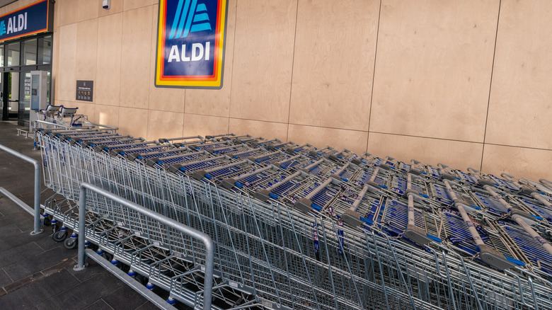 Row of shopping carts in front of Aldi