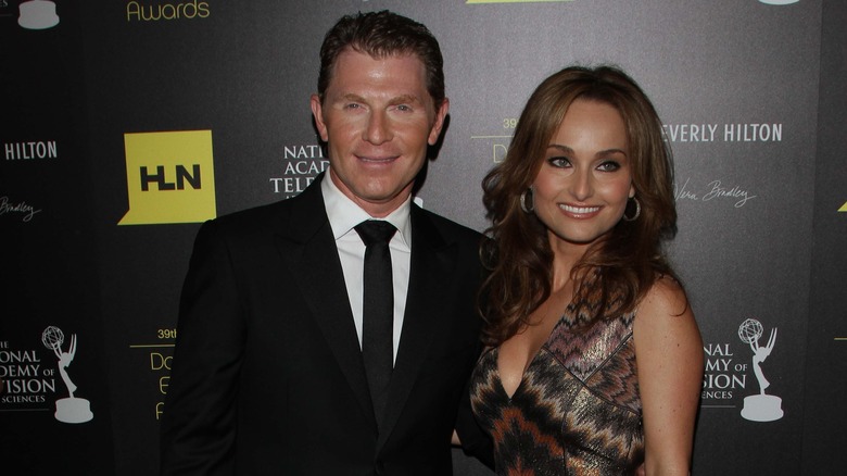 Bobby Flay and Giada De Laurentiis posing