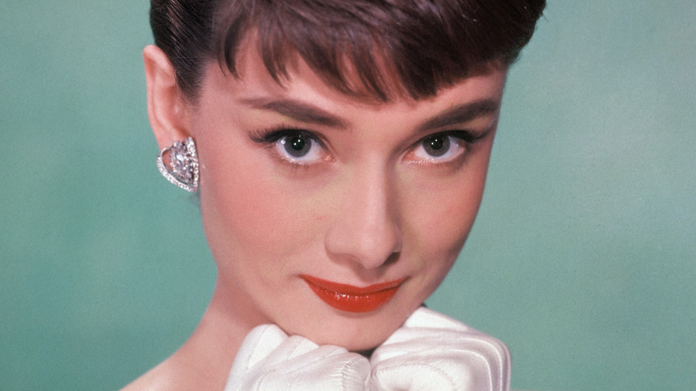 Audrey Hepburn poses in gloves