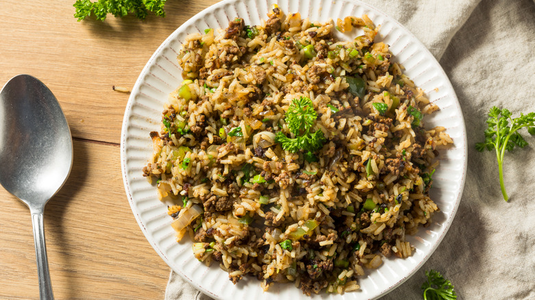 Dirty rice on a white plate