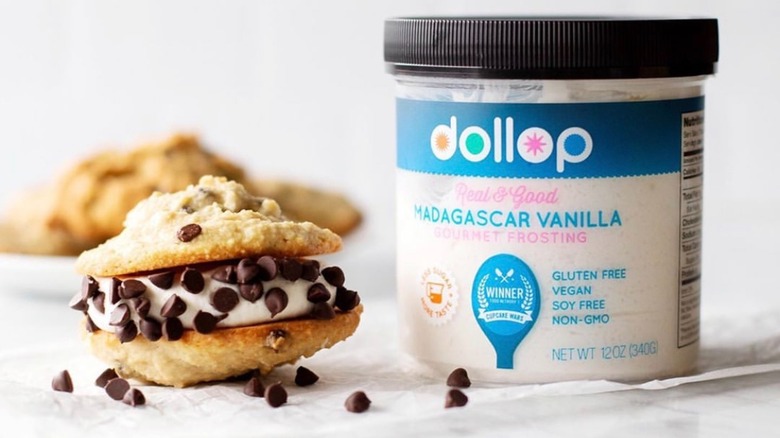jar of Dollop frosting next to cookie dessert