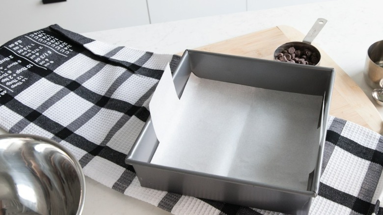 The Smart Baker apron and parchment paper