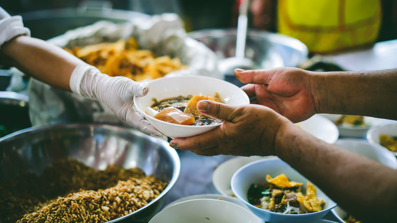 Person receiving food donation at food bank