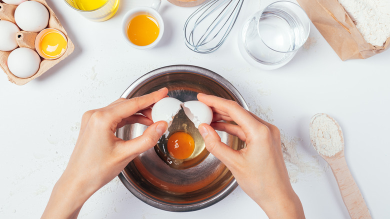 Cacking egg in a bowl