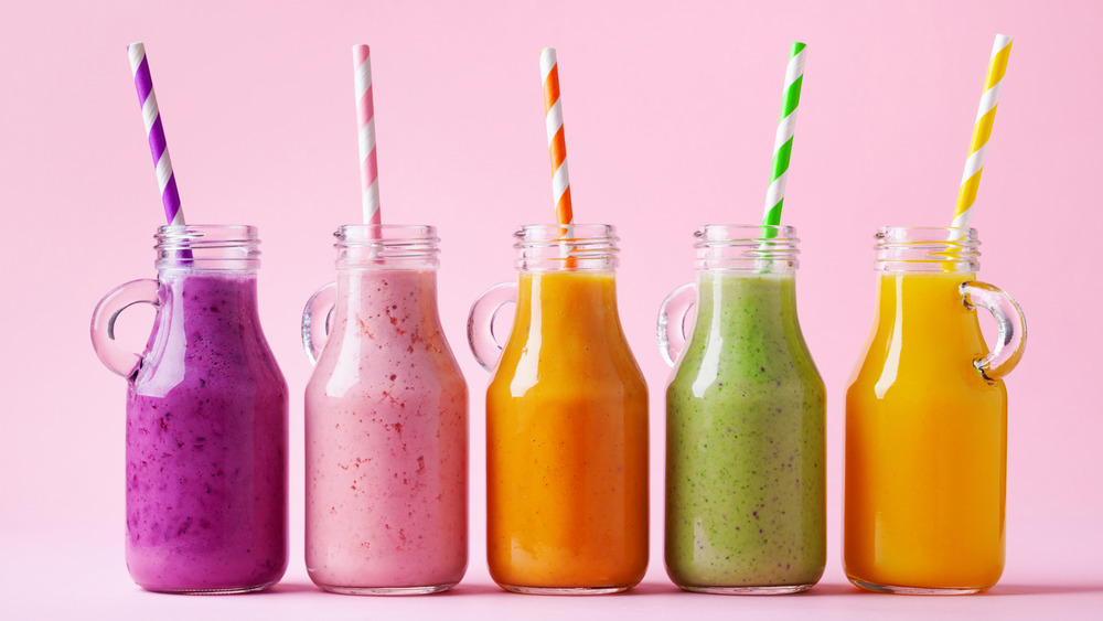 colorful smoothies with straws
