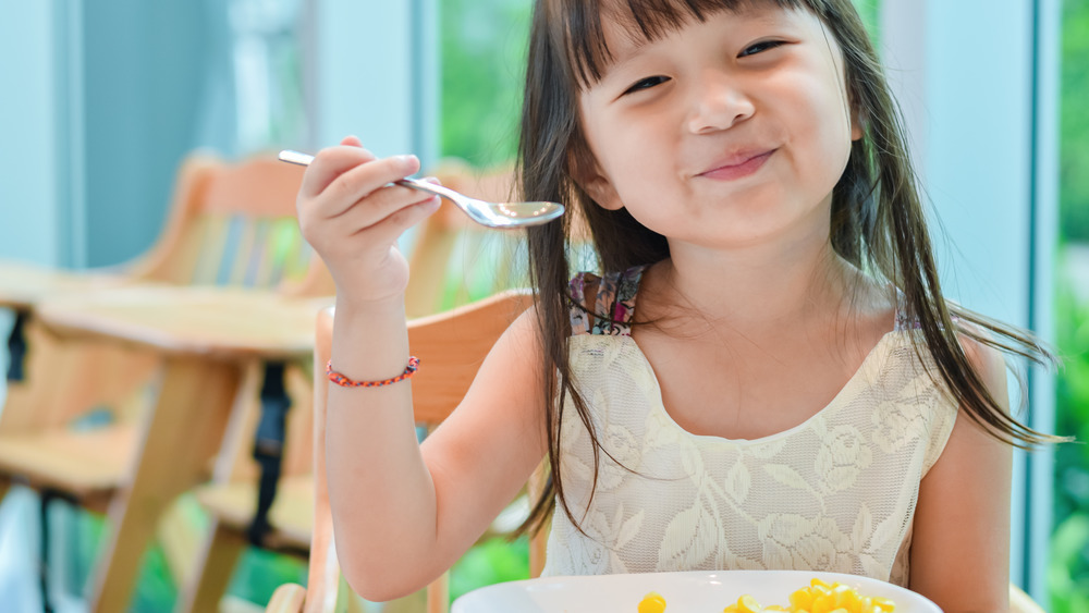 Girl eating cereal