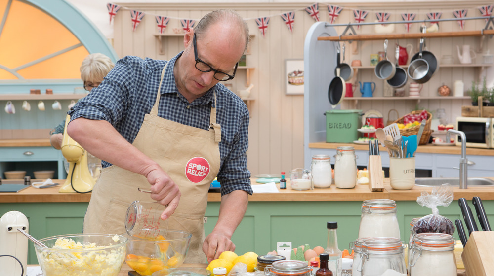 Contestant baking on The Great British Bake Off