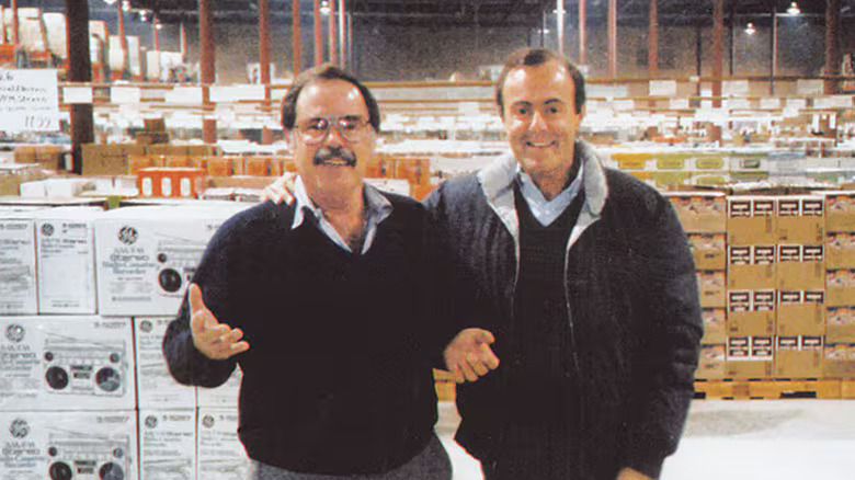 Costco founders Jim Sinegal (left) and Jeff Brotman at the opening of the first Costco warehouse in Seattle in 1983