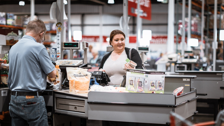 Shoppers checking out at Costco