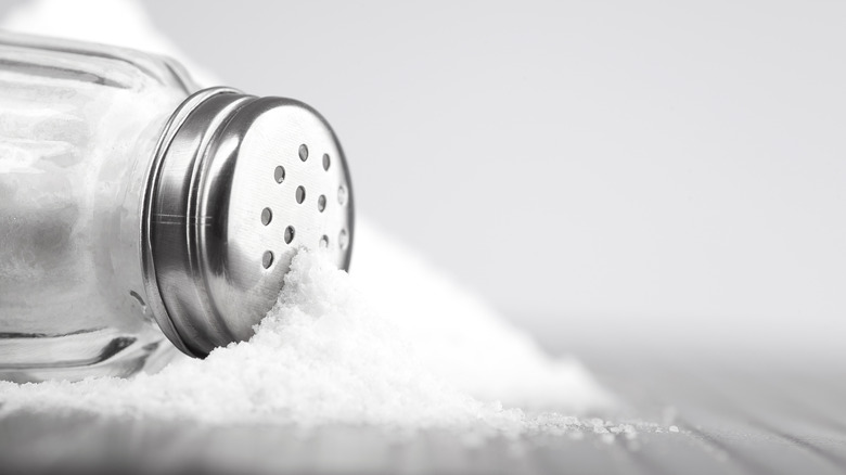 Salt spilling out of shaker