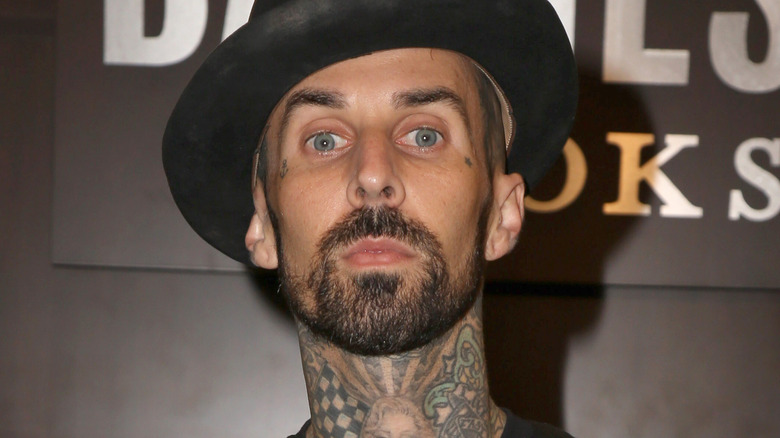 Travis Barker wears a hat