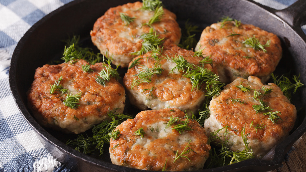 Crab cakes in a cast iron skillet