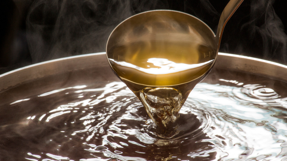 Ladling dashi in pot