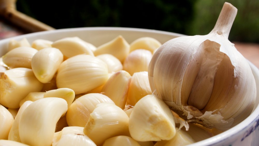 garlic cloves and a head of garlic