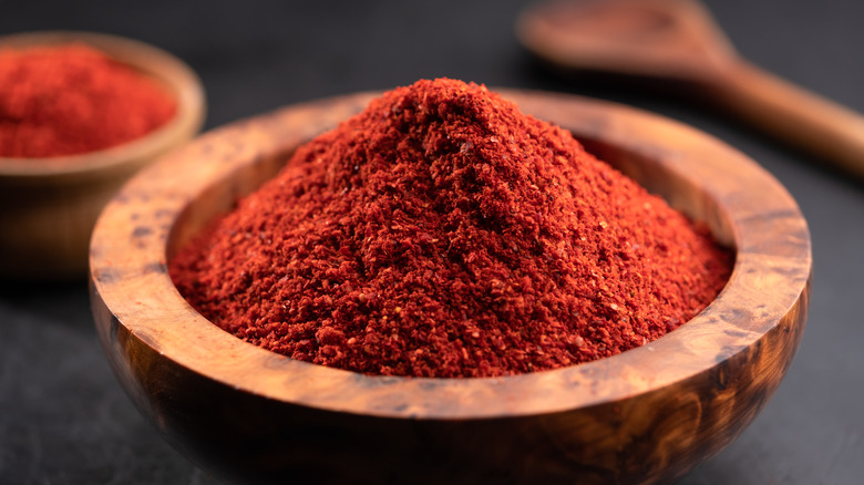 red paprika in a wooden bowl