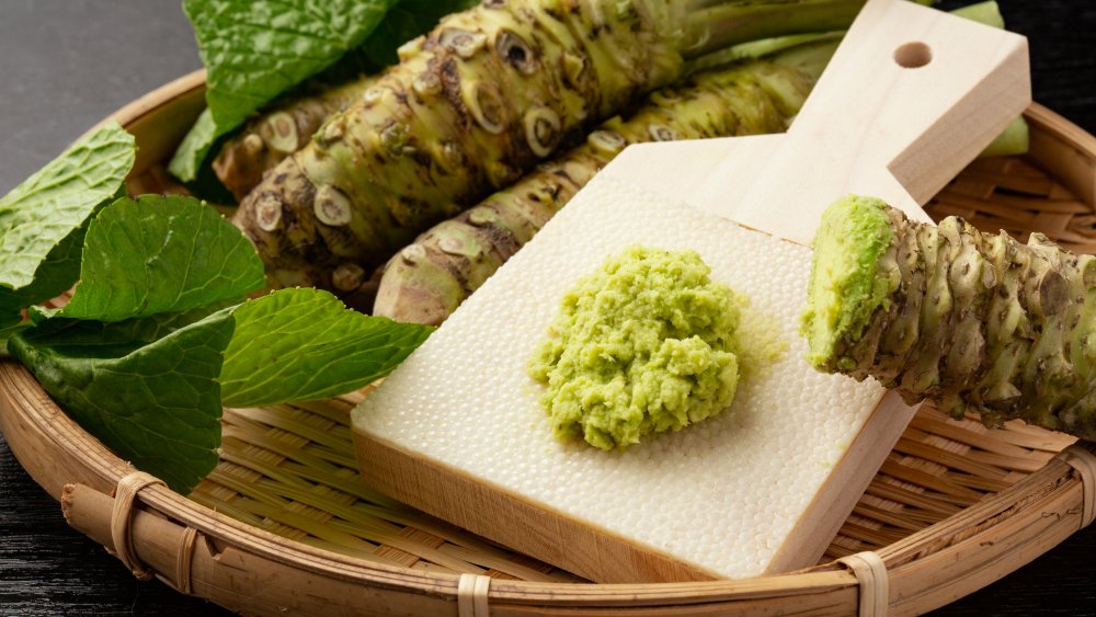 wasabi root displayed on a board