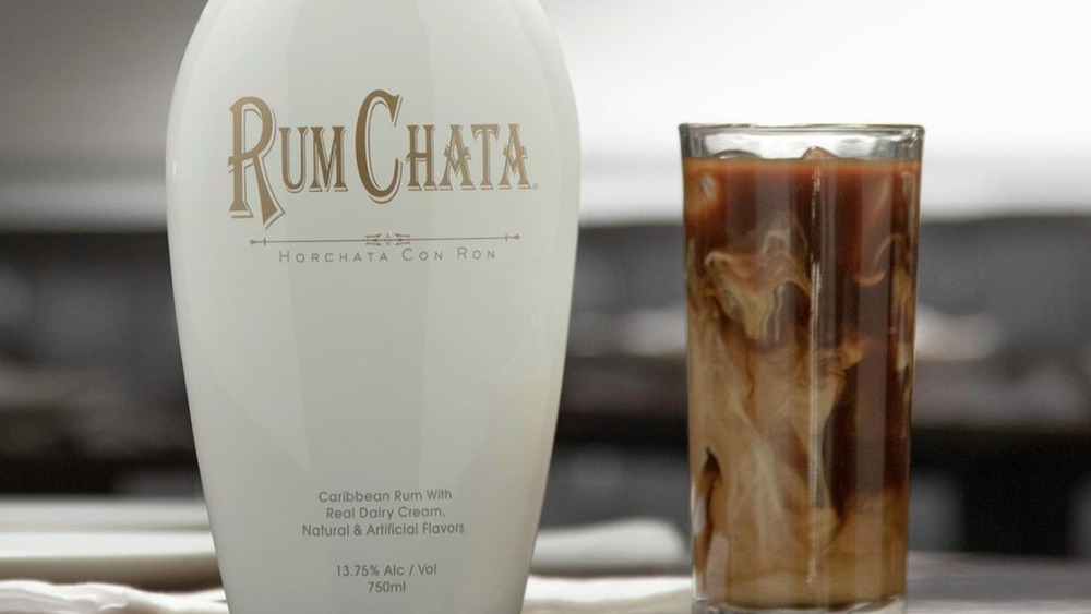 RumChata bottle next to glass