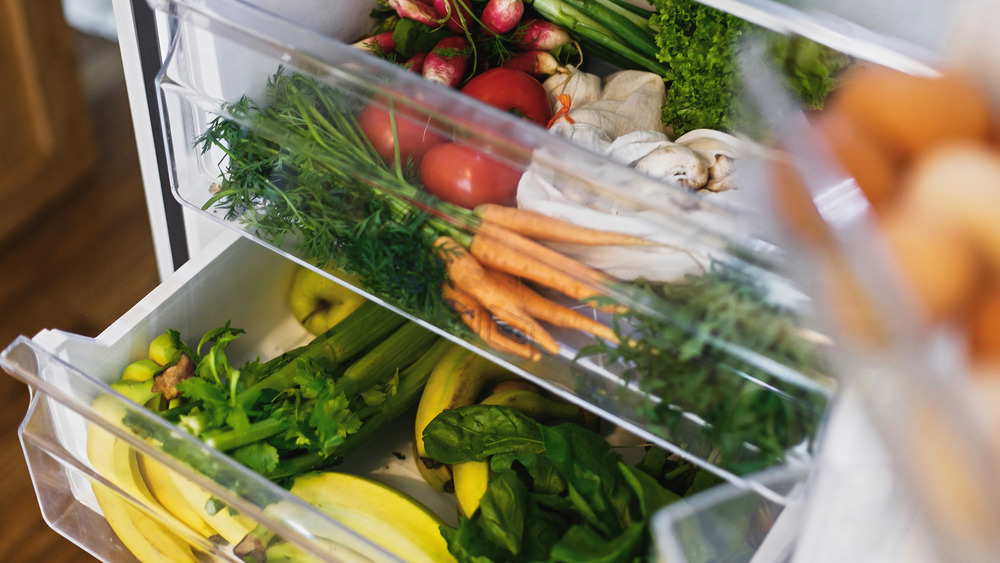 Two crisper drawers inside a refrigerator 