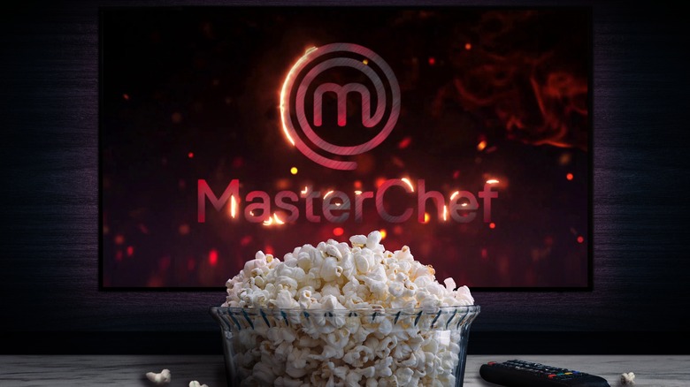 Masterchef on TV behind a bowl of popcorn