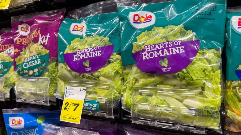 Plastic bags of prewashed Dole salad