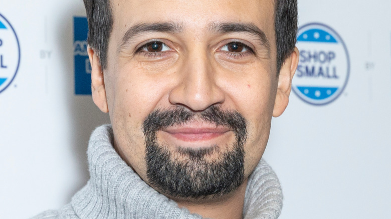 Lin-Manuel Miranda wearing grey turtleneck sweater