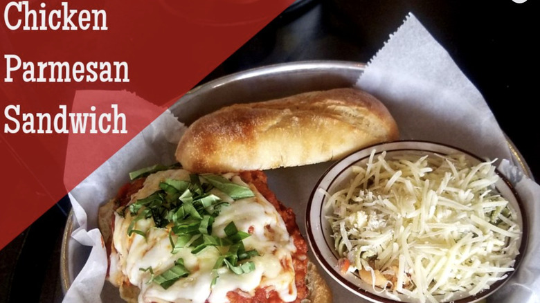The Filling Station's chicken Parmesan sandwich with a salad