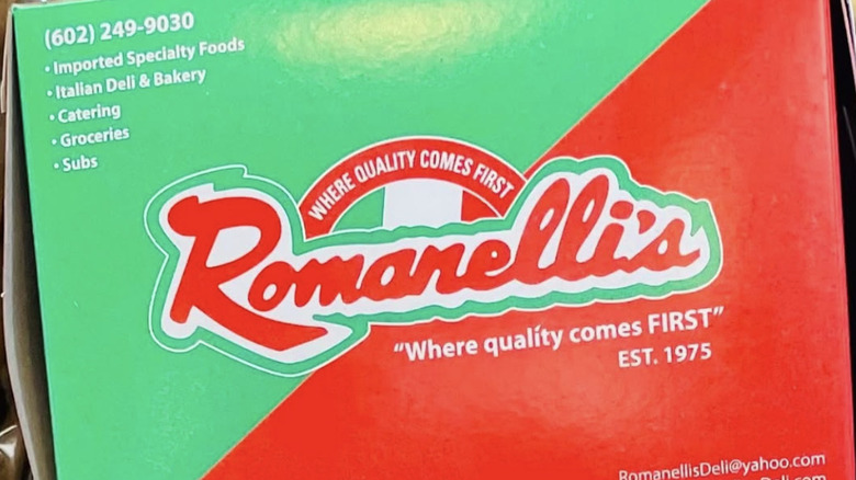 A takeaway box featuring the Romanelli's logo